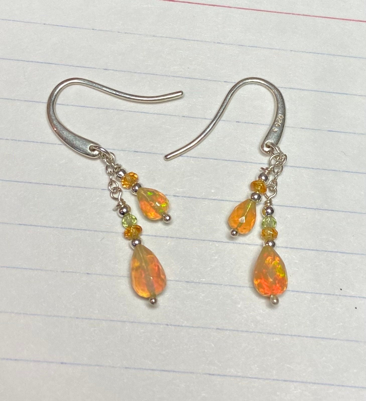 Sterling silver dangle earrings with Ethiopian yellow opal, peridot, and spessartite.