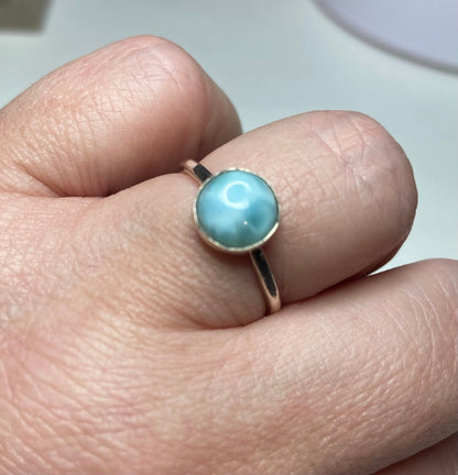 Sterling silver ring with an 8mm round larimar cabochon.