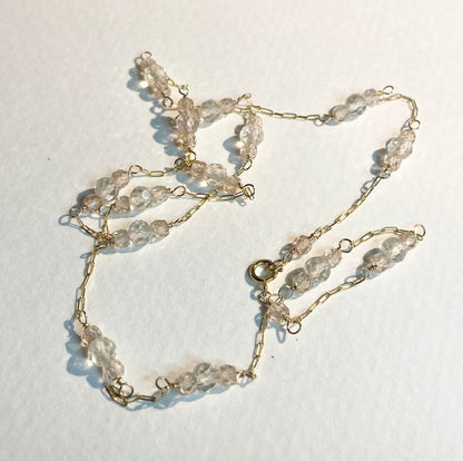 Solid 14k yellow gold necklace with faceted Oregon sunstones and natural zircons.