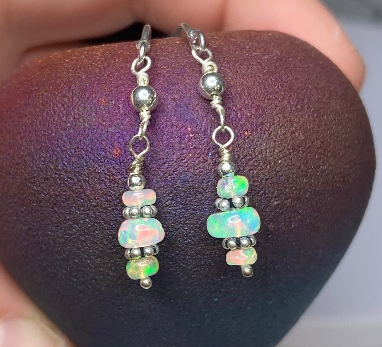 Ethiopian Wello Opal sterling silver dangle drop earrings with colorful beads.