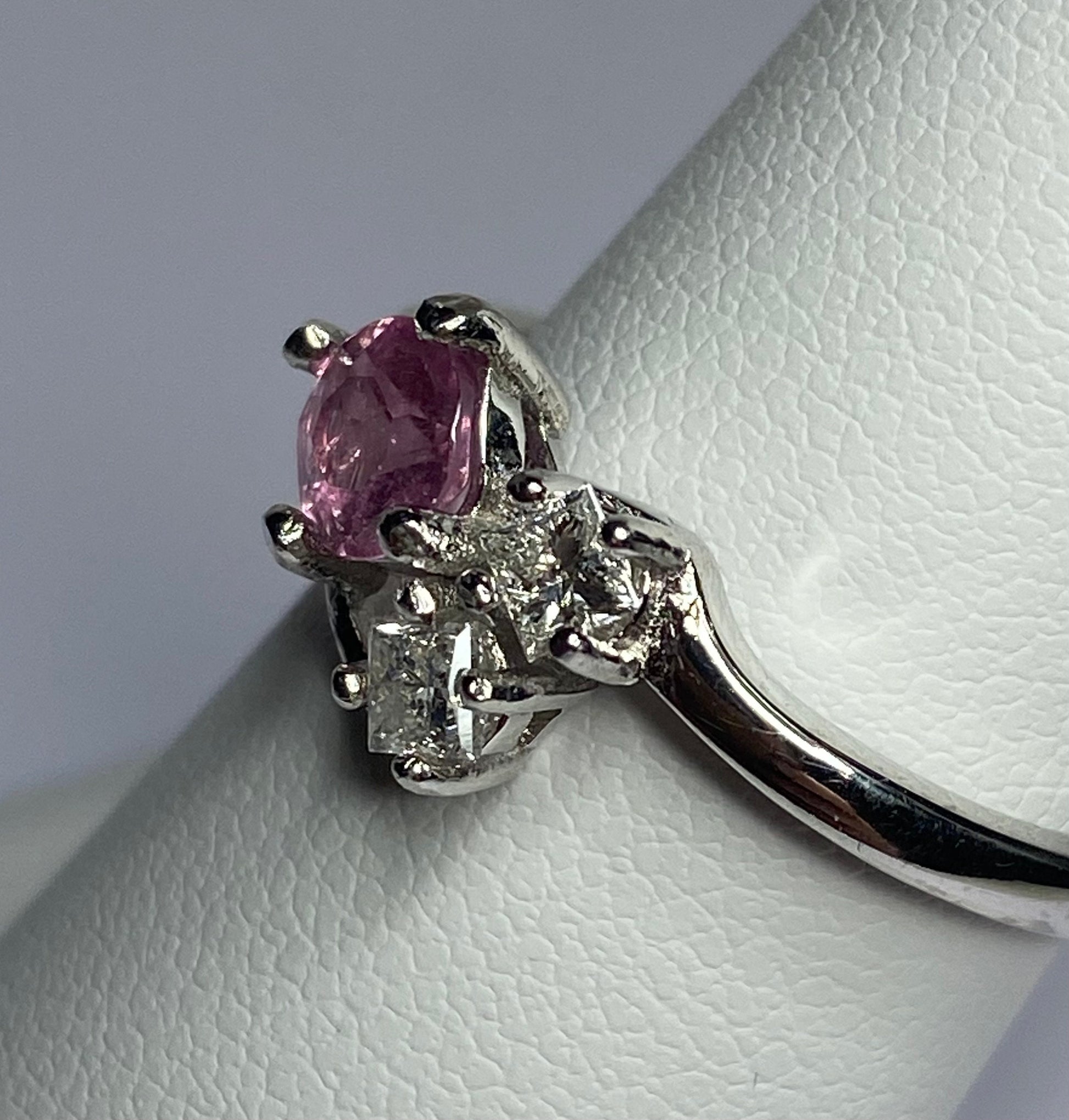 Sterling silver ring with pink tourmaline and diamonds.