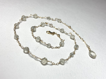 14k yellow gold choker necklace with light yellow Oregon Sunstone beads and a briolette pendant.