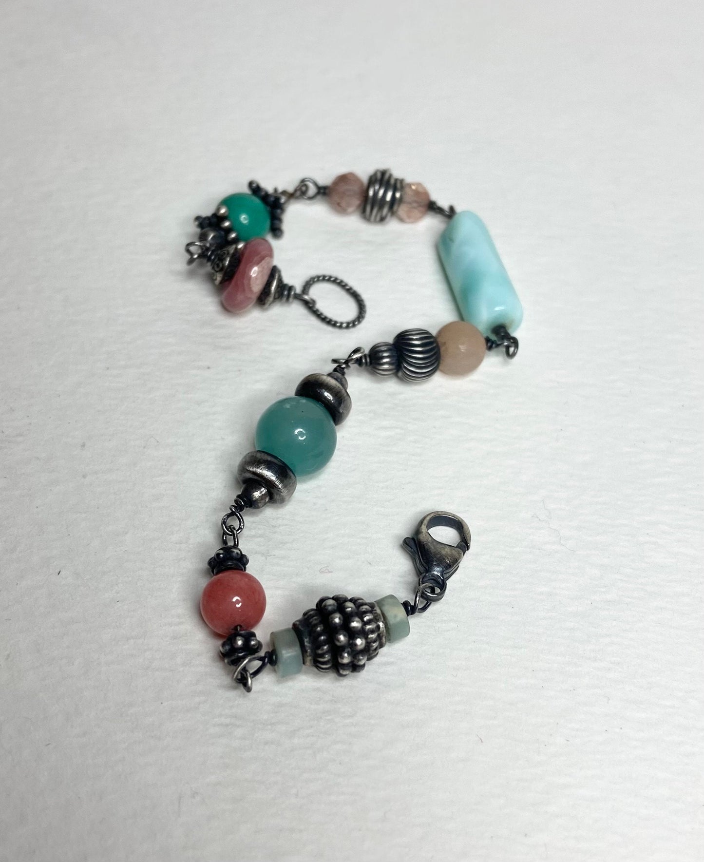 Eclectic peach and blues sterling silver wire bead bracelet Peruvian opal Oregon sunstone, rhodochrosite, morganite, amazonite and more