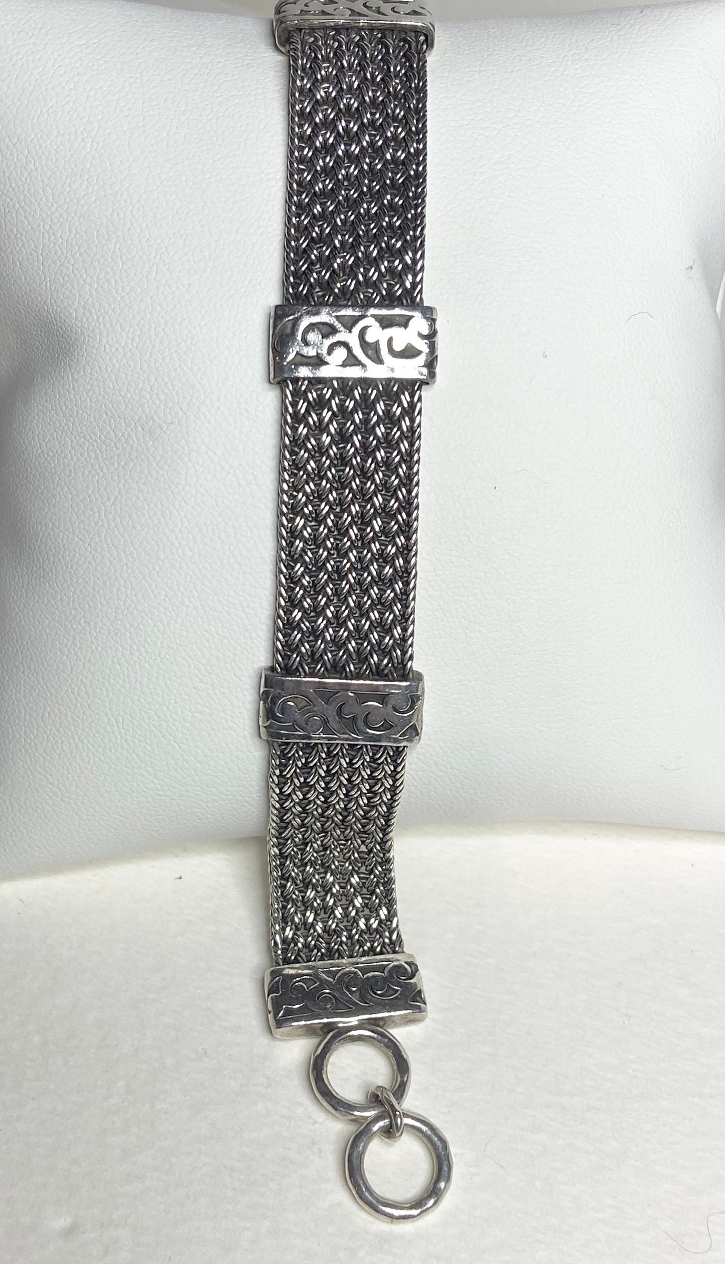 Lois Hill wide woven sterling silver bracelet with toggle closure.