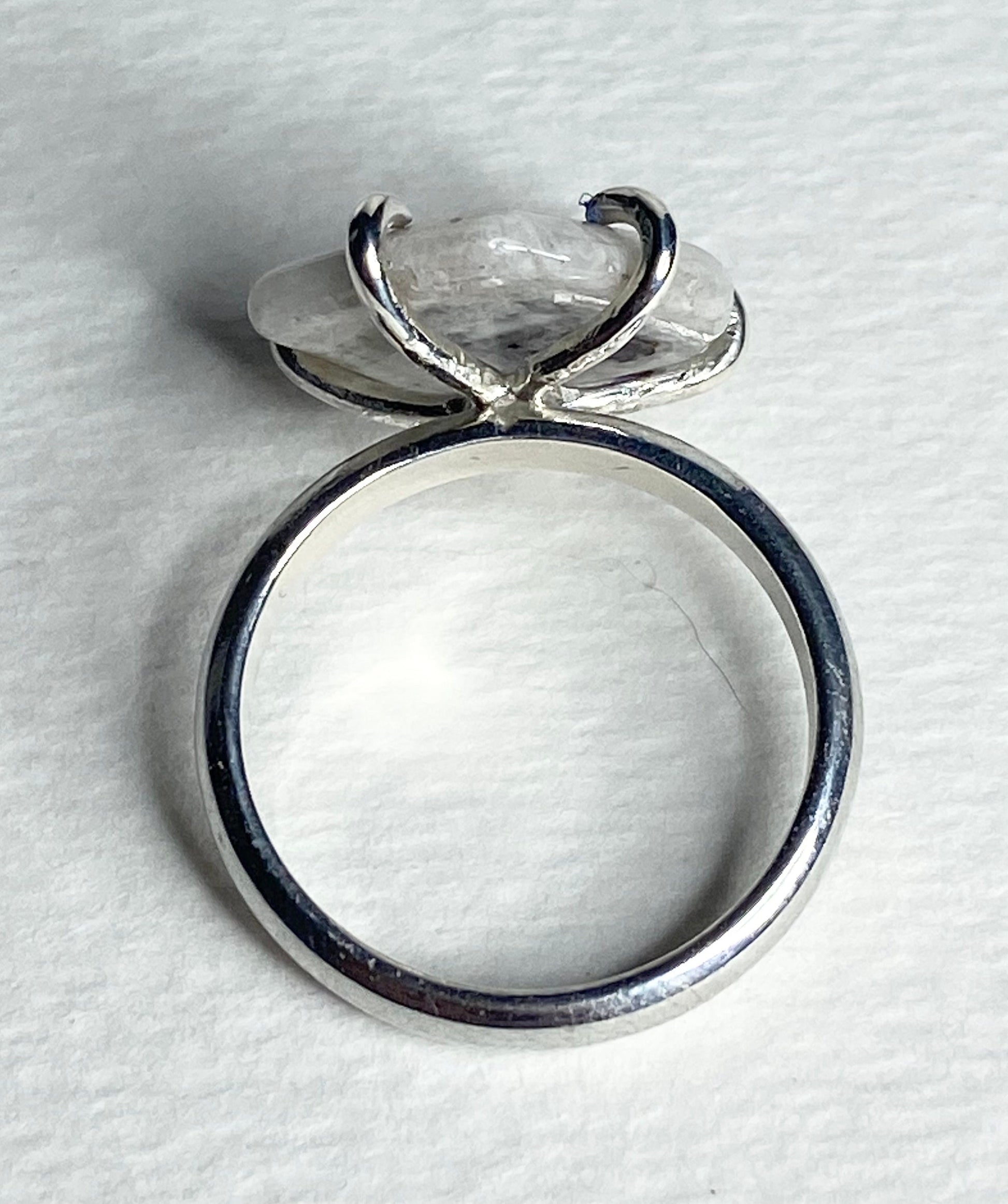 Sterling silver ring with a freeform quartz stone and amethyst inclusions, size 8.