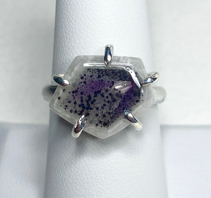 Sterling silver ring with a hexagonal quartz stone featuring amethyst inclusions.