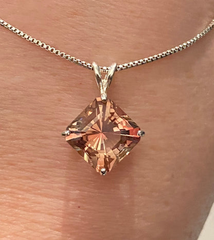 Sterling silver pendant necklace with a large, square-cut Oregon sunstone.