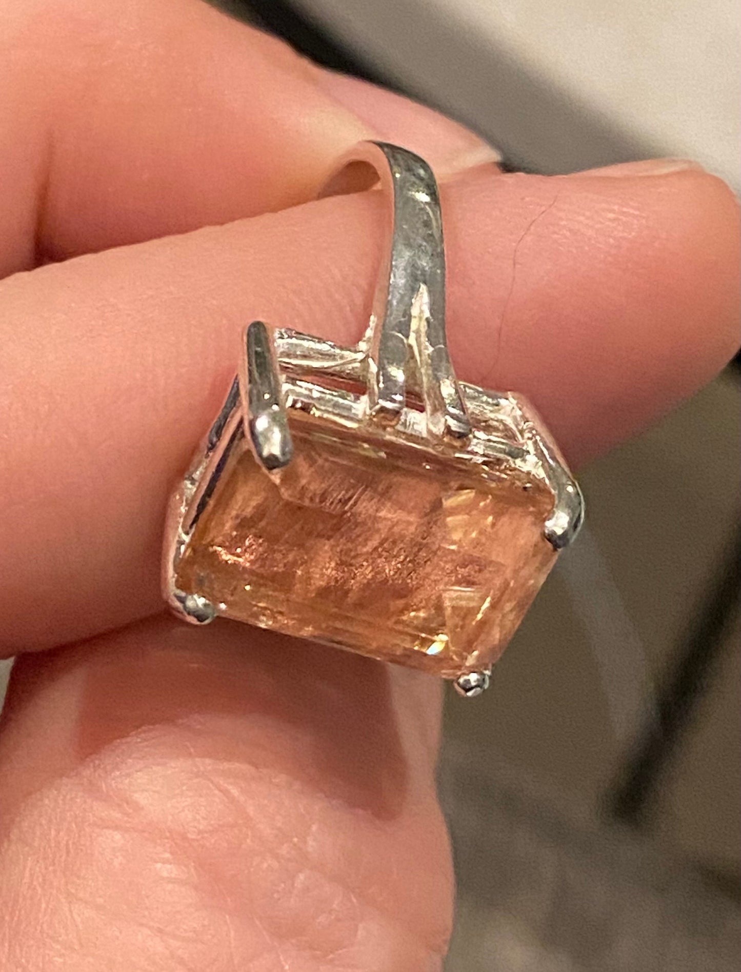 Sterling silver ring with a large, emerald-cut Oregon sunstone.