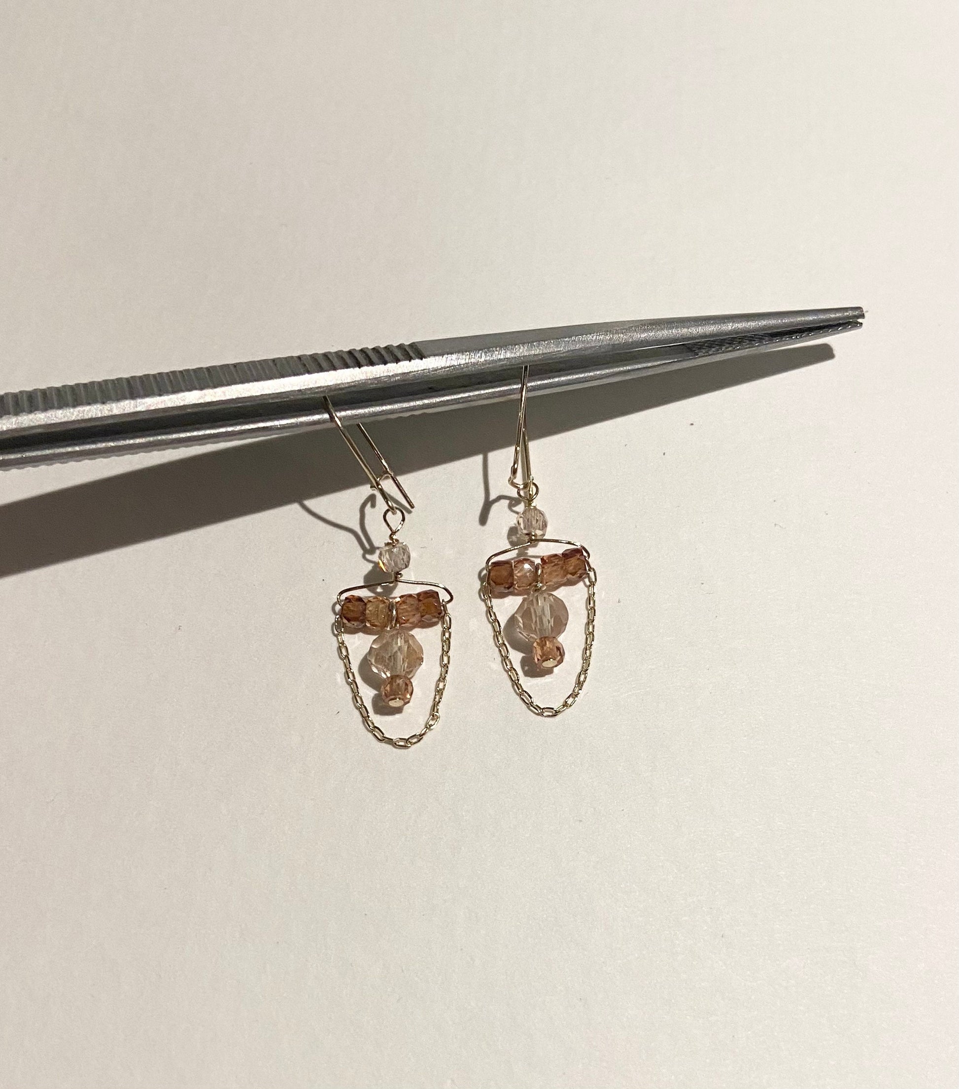 14k gold dangle earrings with Oregon sunstones and natural zircons.