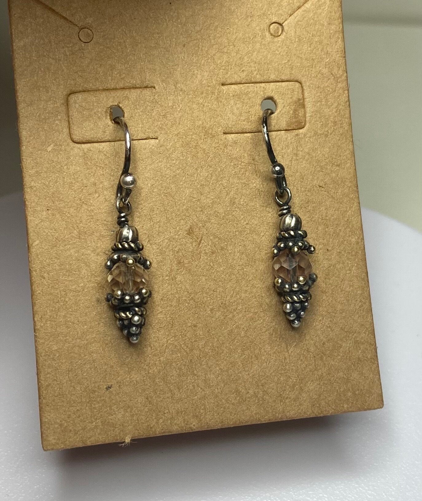 Oregon sunstone dangle drop Bali style earrings in solid sterling silver.