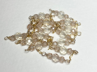 A delicate 14k yellow gold necklace with faceted Oregon sunstones and natural zircons.