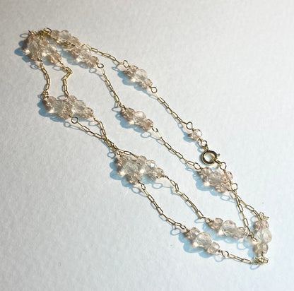 14k yellow gold necklace with Oregon sunstone and zircon stations.