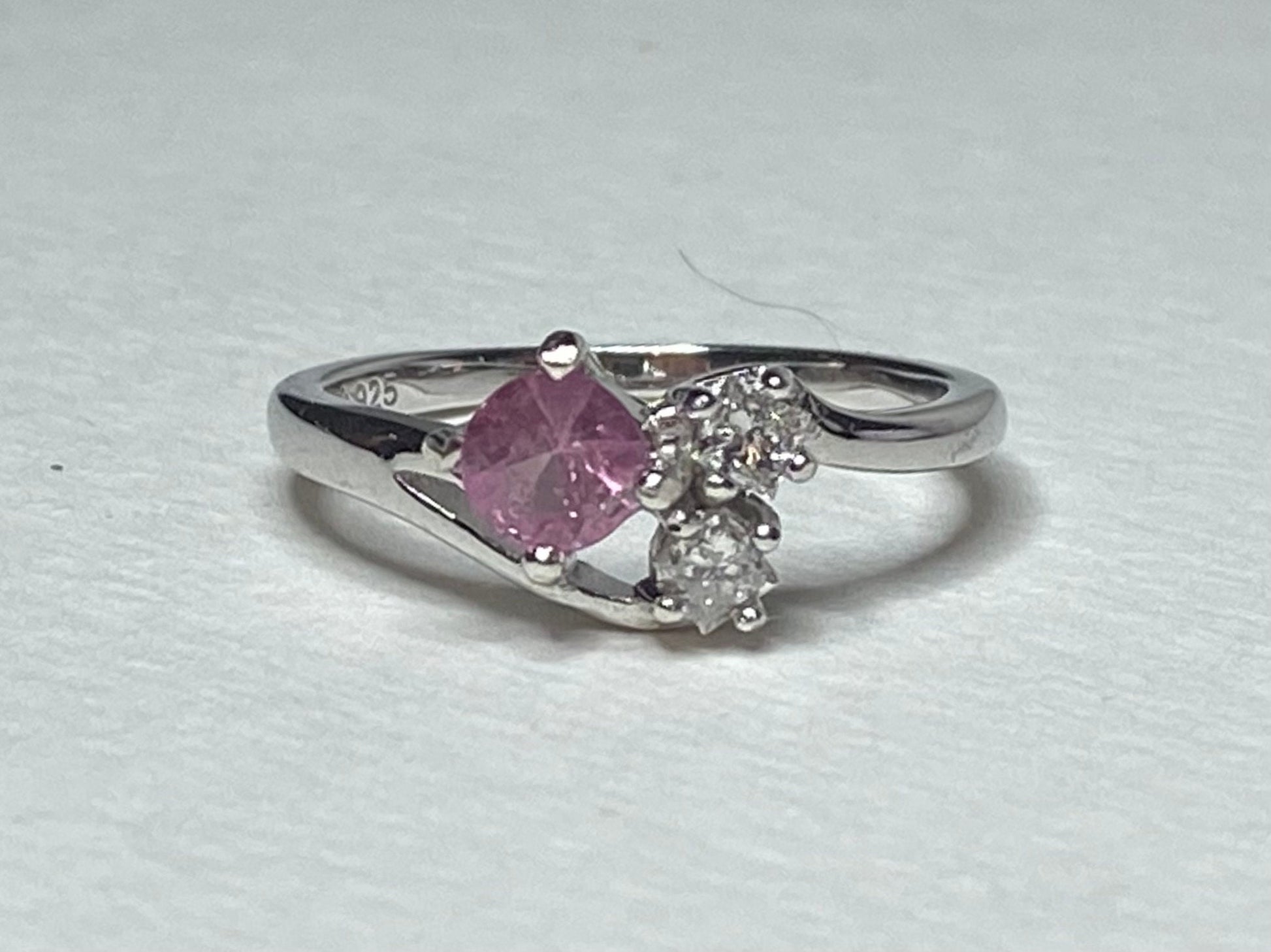 Sterling silver ring with pink tourmaline and diamonds.