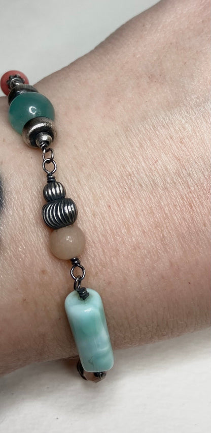 Eclectic peach and blues sterling silver wire bead bracelet Peruvian opal Oregon sunstone, rhodochrosite, morganite, amazonite and more