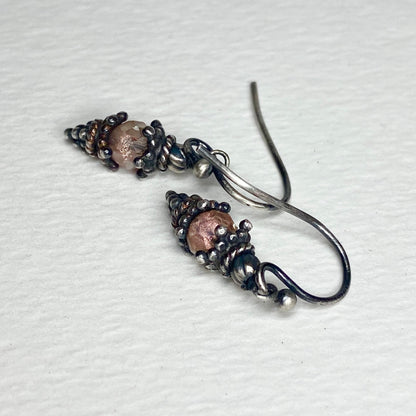 Oregon sunstone dangle drop Bali style earrings in solid sterling silver.