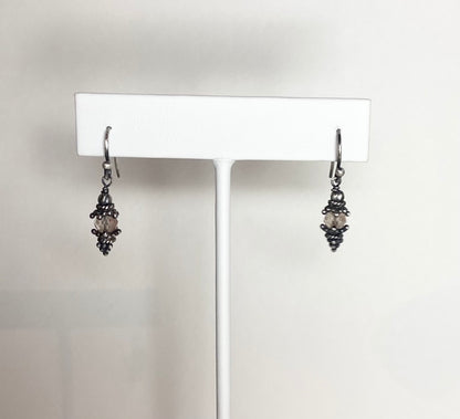 Sterling silver dangle earrings with Oregon sunstone beads.