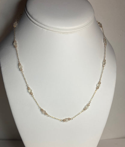 14k yellow gold necklace with Oregon sunstone and zircon stations.