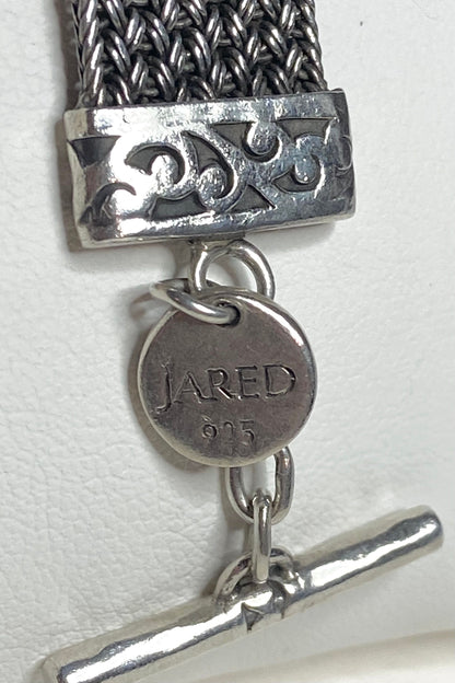 Lois Hill wide woven toggle sterling silver bracelet with "JARED 925" charm.