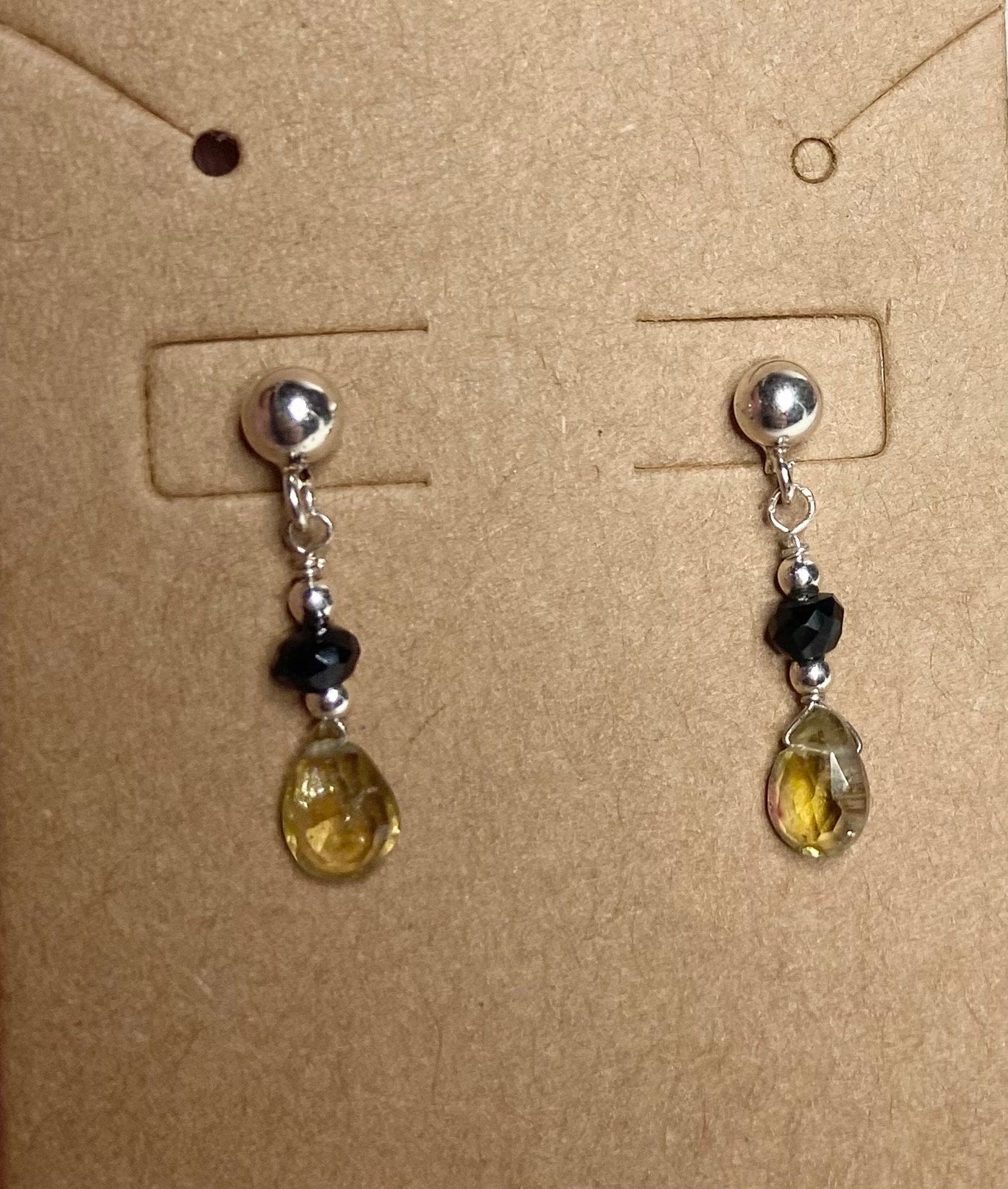 Sterling silver dangle earrings with black and yellow tourmaline beads.