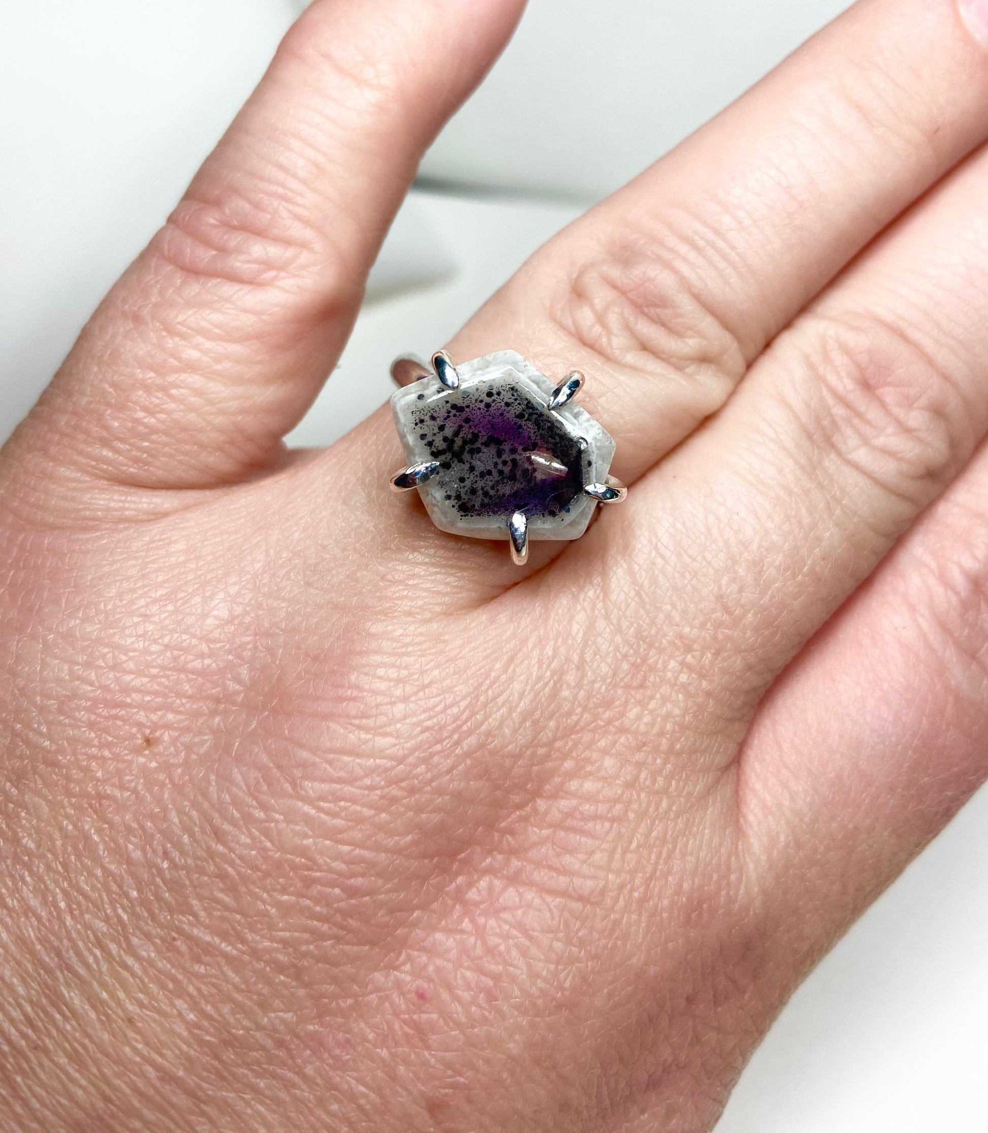 Sterling silver ring with a freeform quartz and amethyst stone, size 8.
