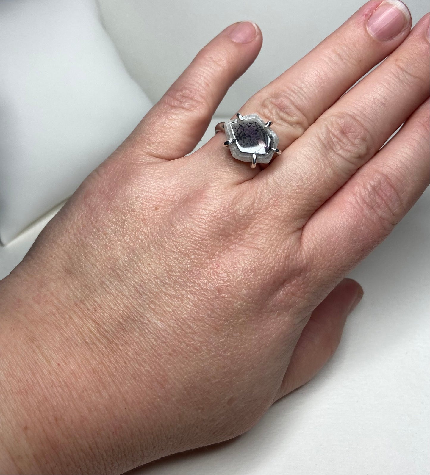 Sterling silver ring with a freeform quartz stone featuring amethyst inclusions, size 8.