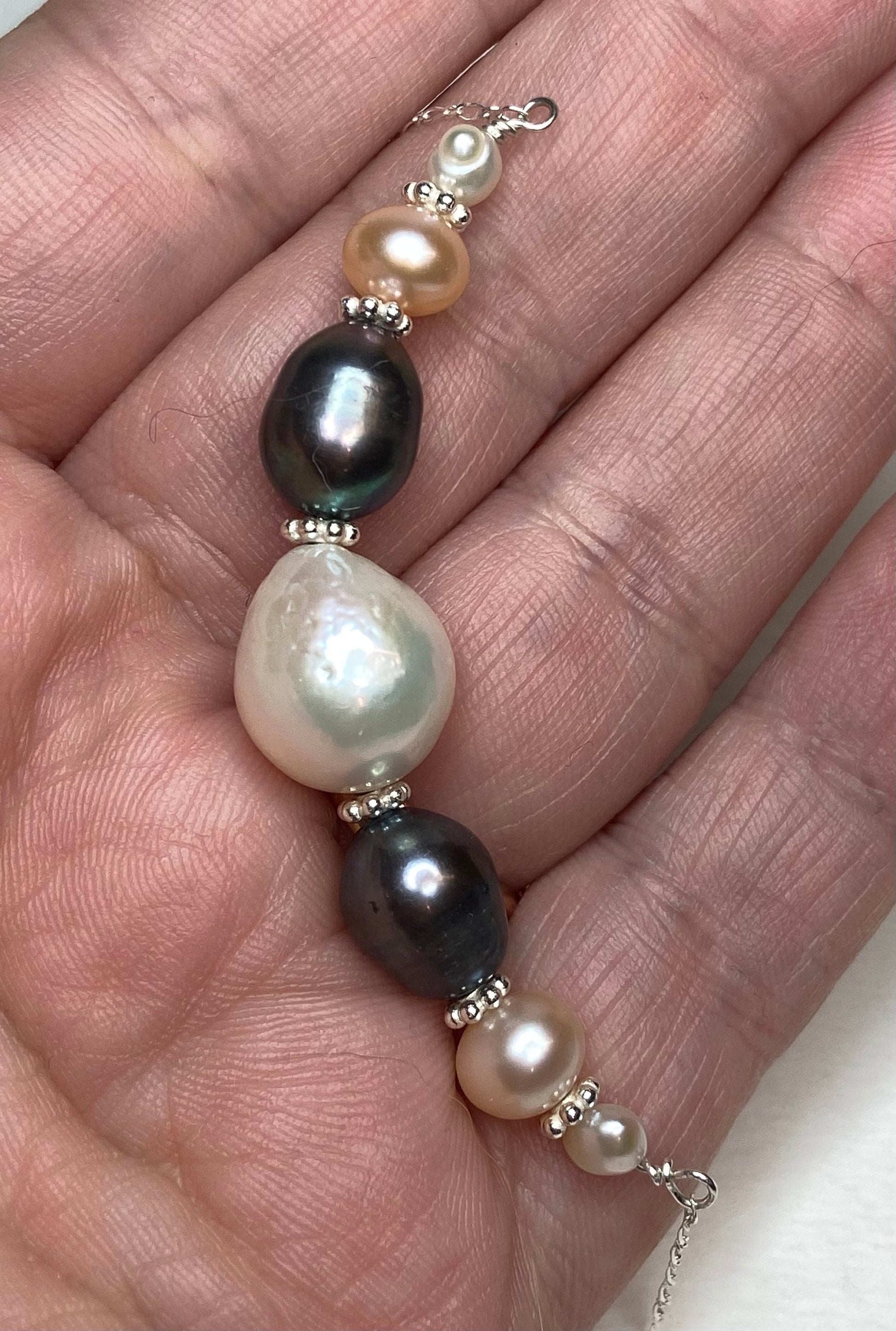 Freshwater pearl multi-colored sterling silver beaded station necklace.