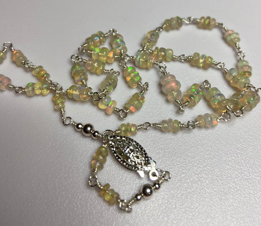 Ethiopian Wello Opal beaded necklace in solid sterling silver with a filigree clasp.
