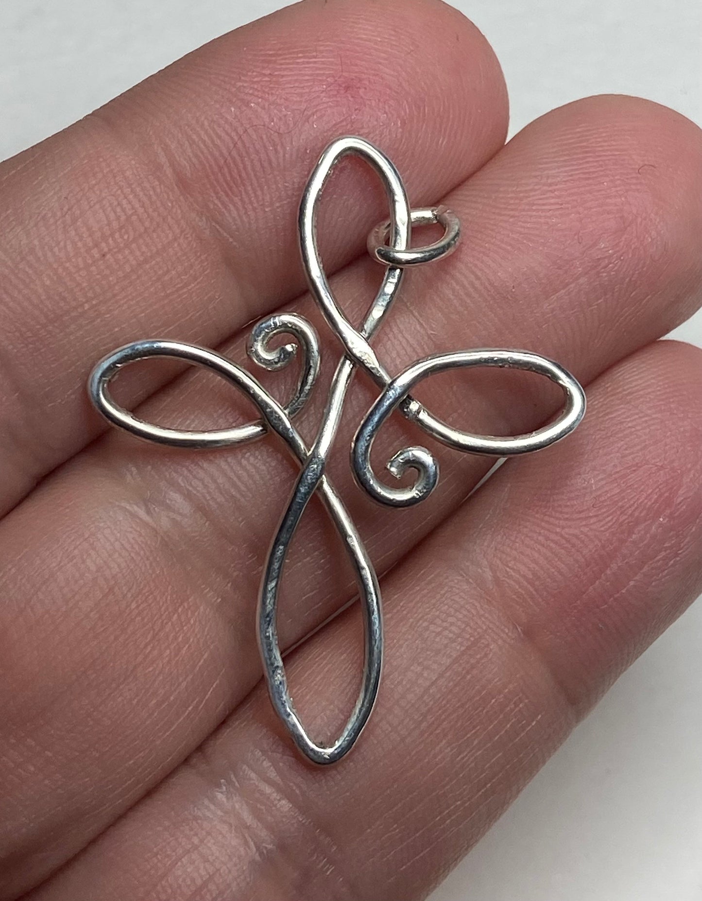 Infinity style CROSS pendant hand forged in sterling silver from my original art