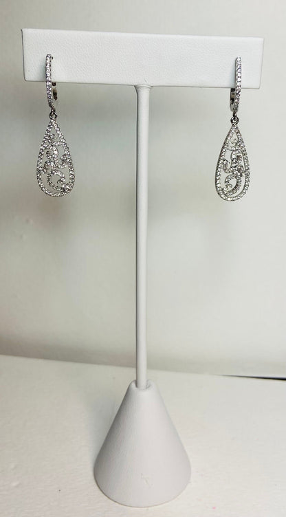 Sterling silver pave tear drop dangle earrings with lever backs.