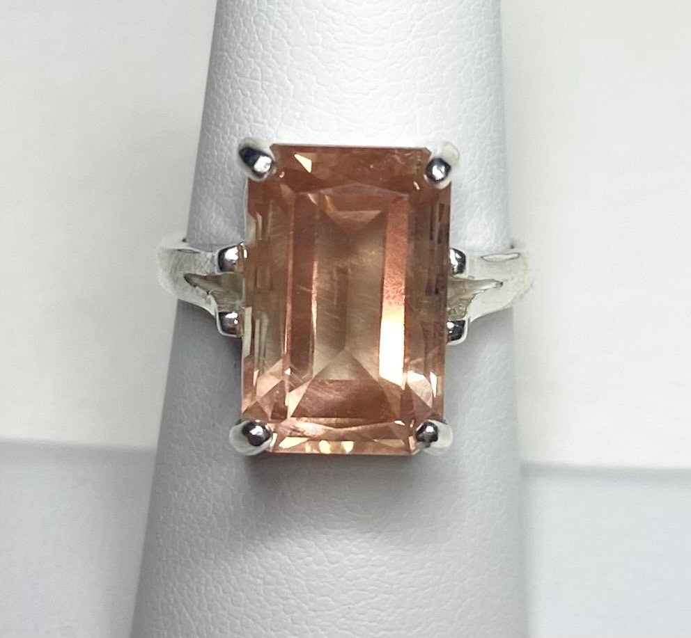 Sterling silver ring with a large emerald-cut Oregon sunstone.