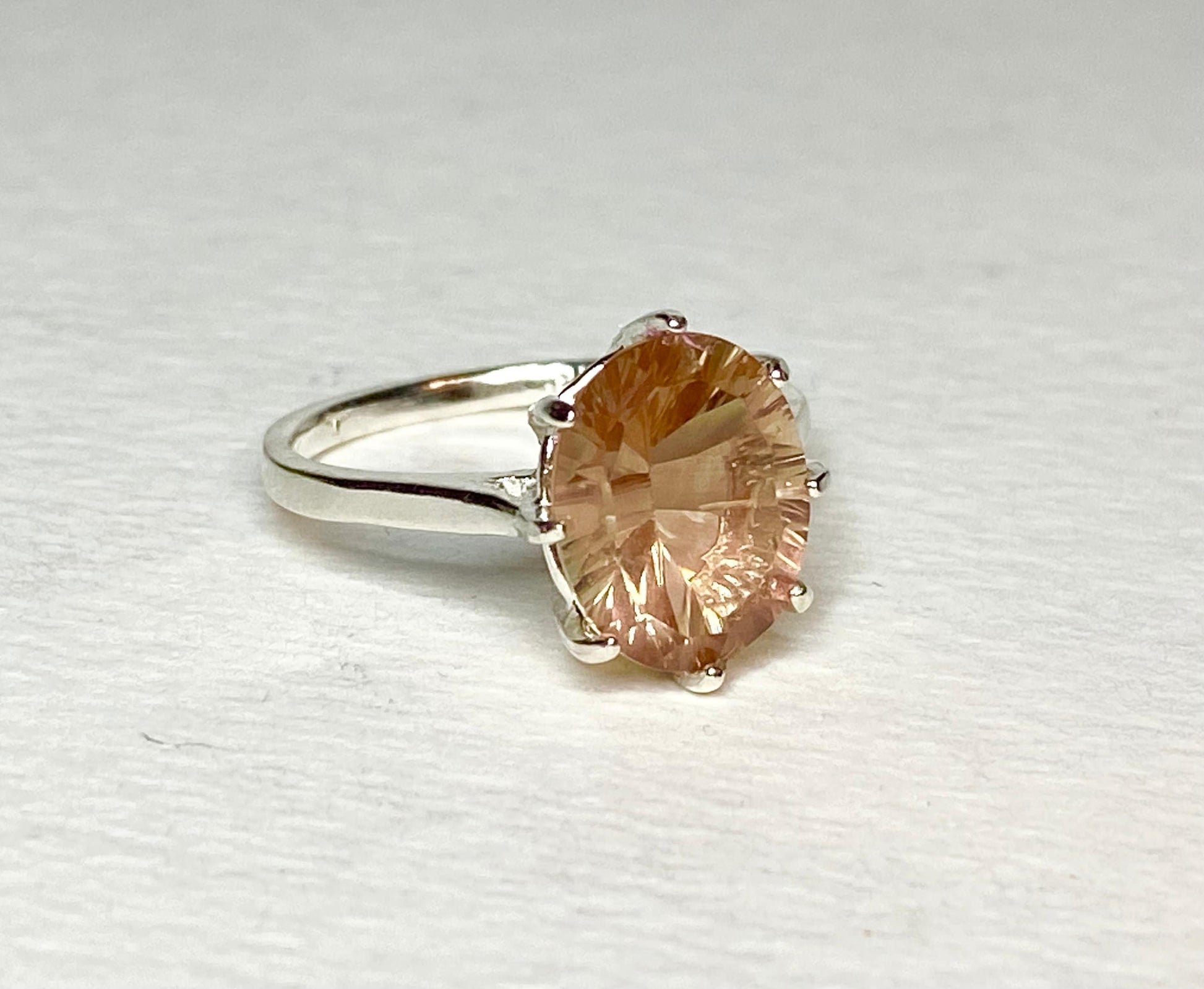 Sterling silver ring with a large oval Oregon sunstone.
