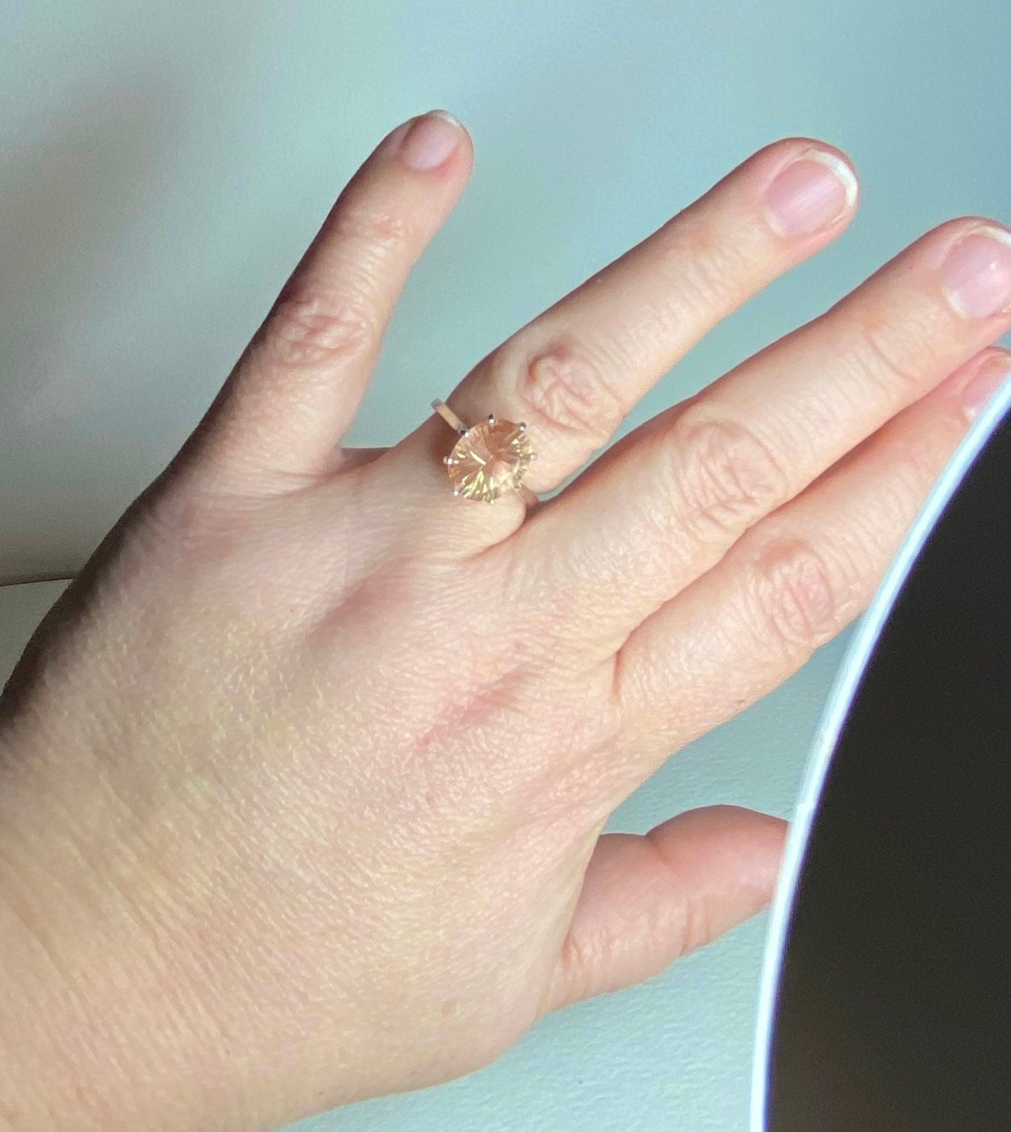 Fancy cut Oregon sunstone solitaire ring in sterling silver.