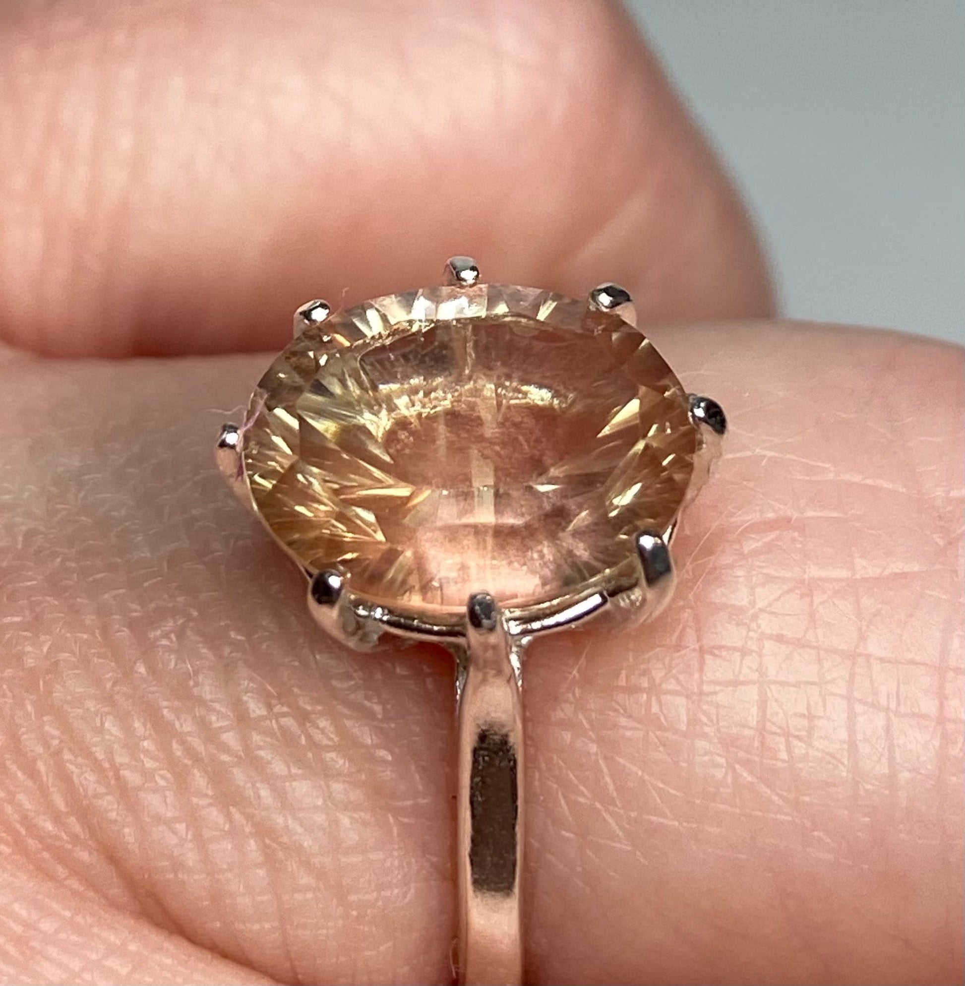 Sterling silver ring with a 3.31ct oval Oregon sunstone.