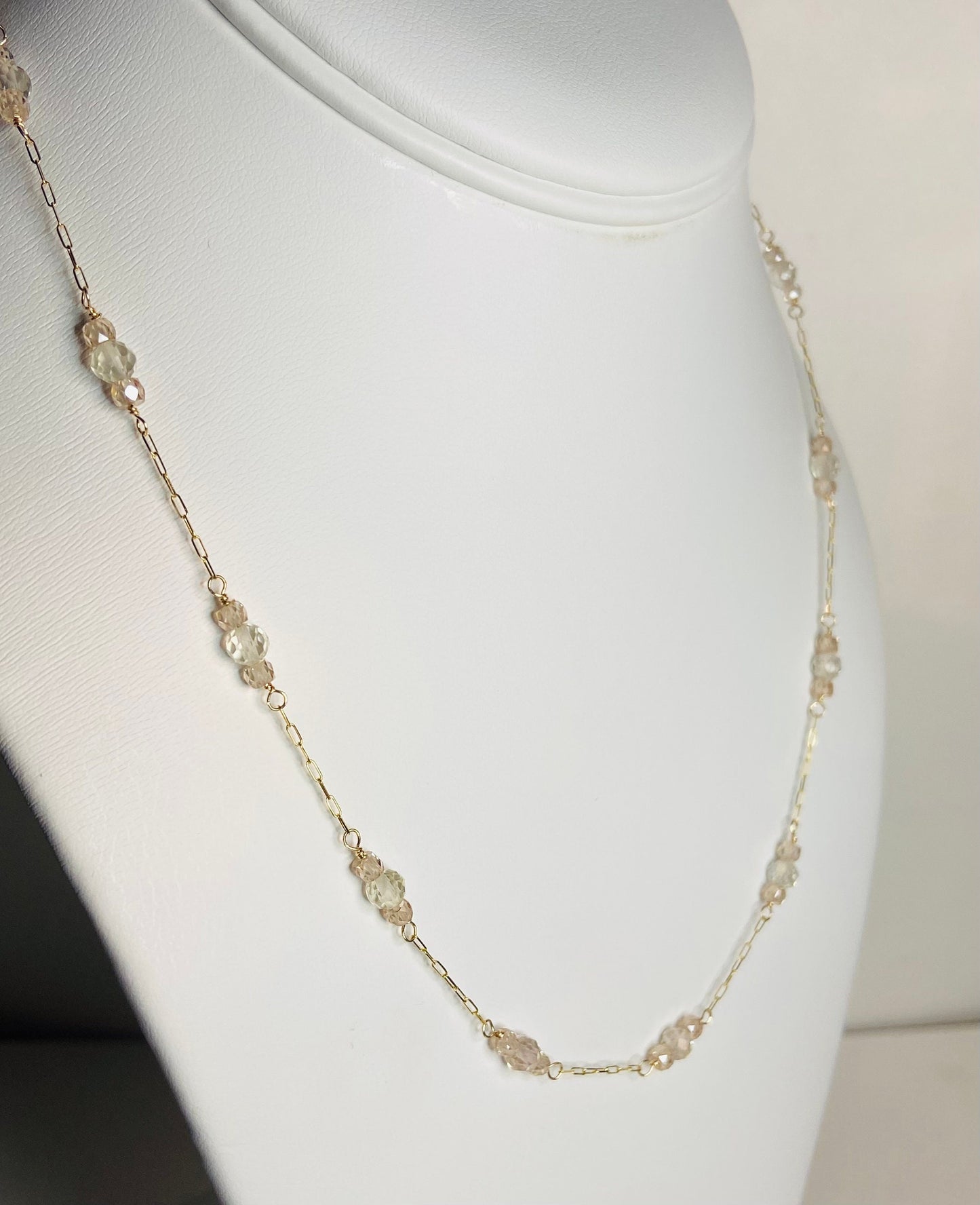 Solid 14k yellow gold necklace with Oregon sunstone and natural zircon stations.