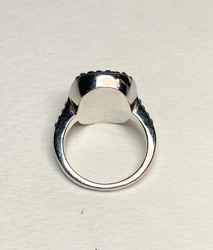 Sterling silver ring with Montana blue Swarovski crystals and a halo band.