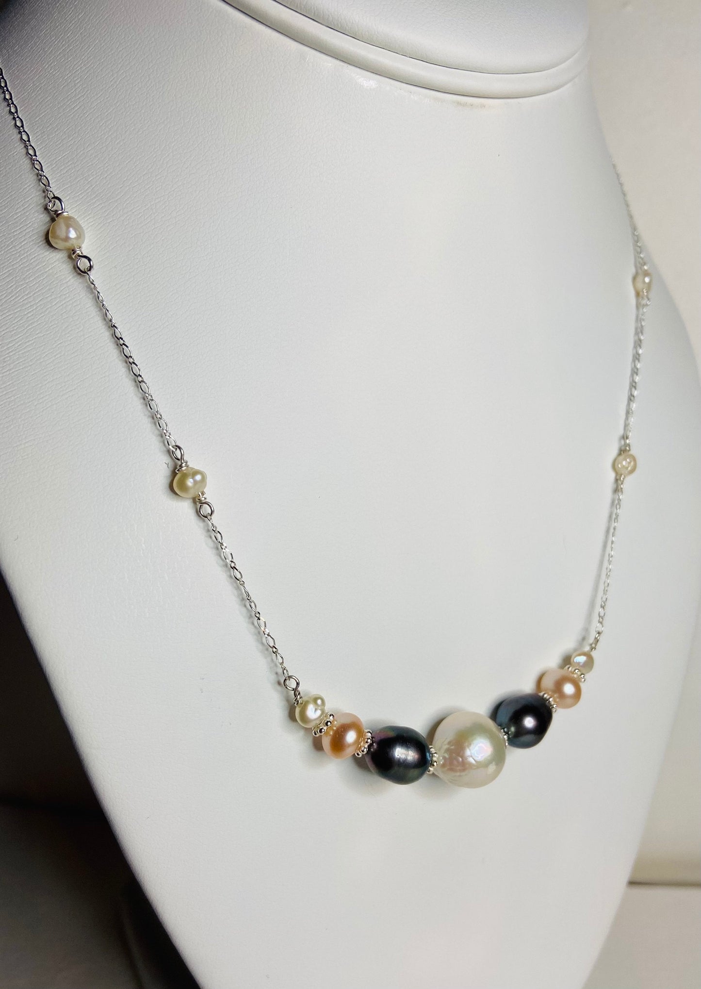 Freshwater pearl multi-colored sterling silver beaded station necklace.