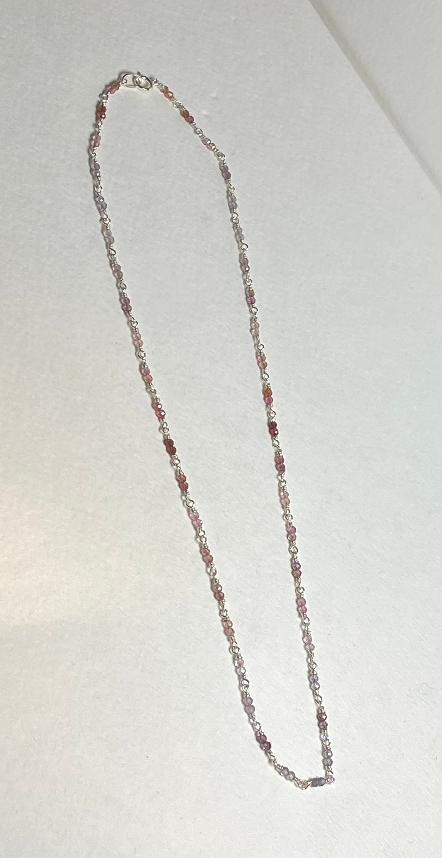 Natural multi-colored spinel beaded necklace in solid sterling silver.