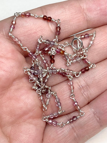 Natural multi-colored spinel beaded necklace in solid sterling silver.