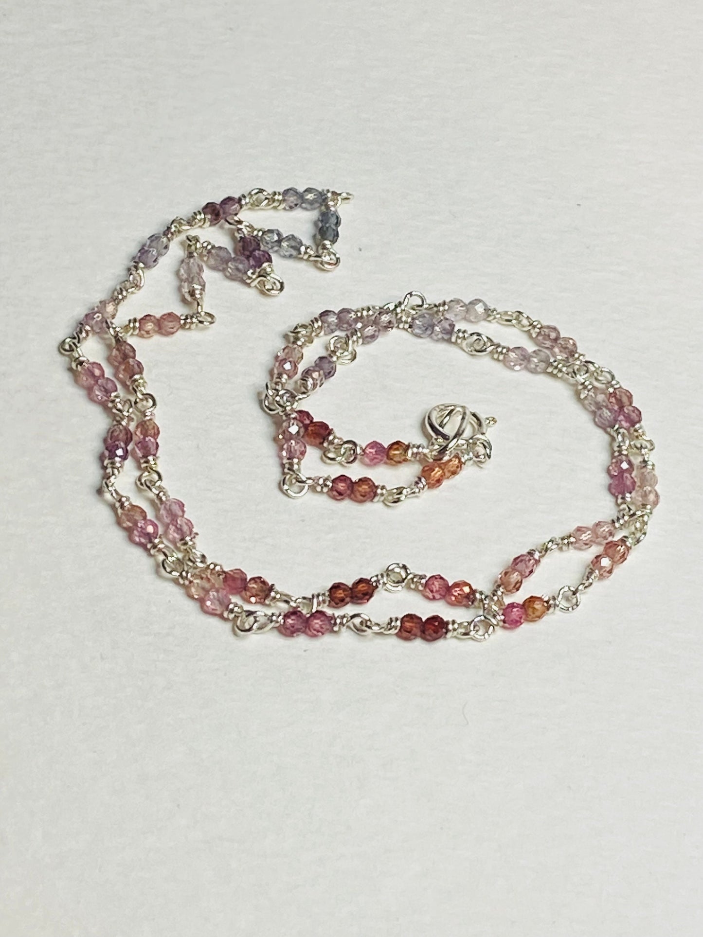 Natural multi-colored spinel beaded necklace in solid sterling silver.