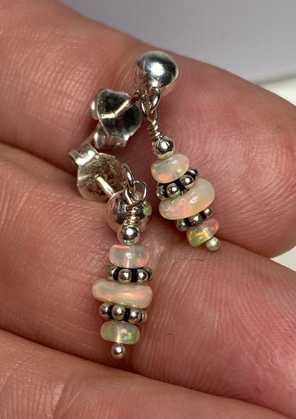 Sterling silver dangle earrings with Ethiopian Wello opals and silver beads.