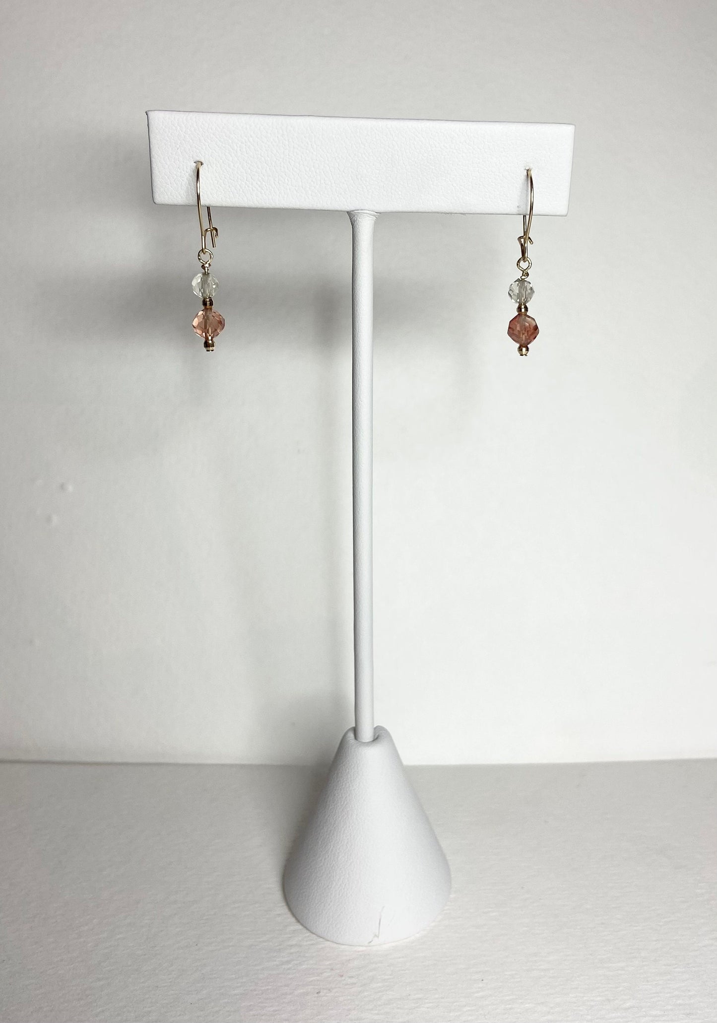 Solid 14k gold dangle earrings with faceted Oregon Sunstone beads.