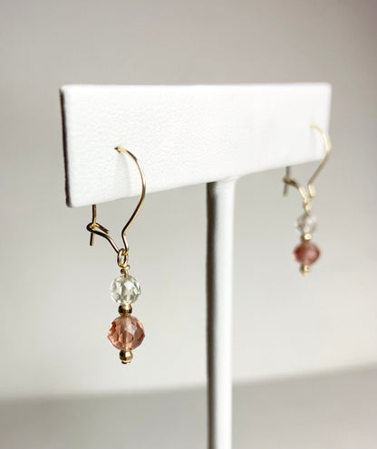 Solid 14k gold dangle earrings with faceted Oregon Sunstone beads.