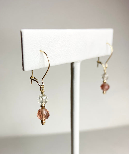 Solid 14k gold dangle earrings with faceted Oregon Sunstone beads.