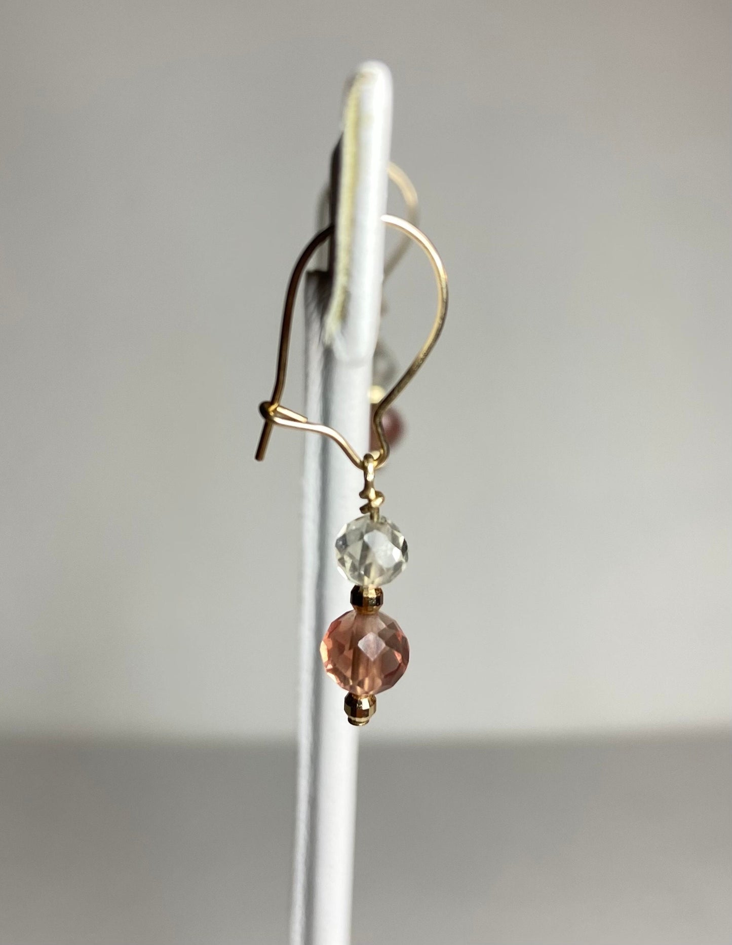 Solid 14k gold dangle earrings with faceted Oregon Sunstone beads.