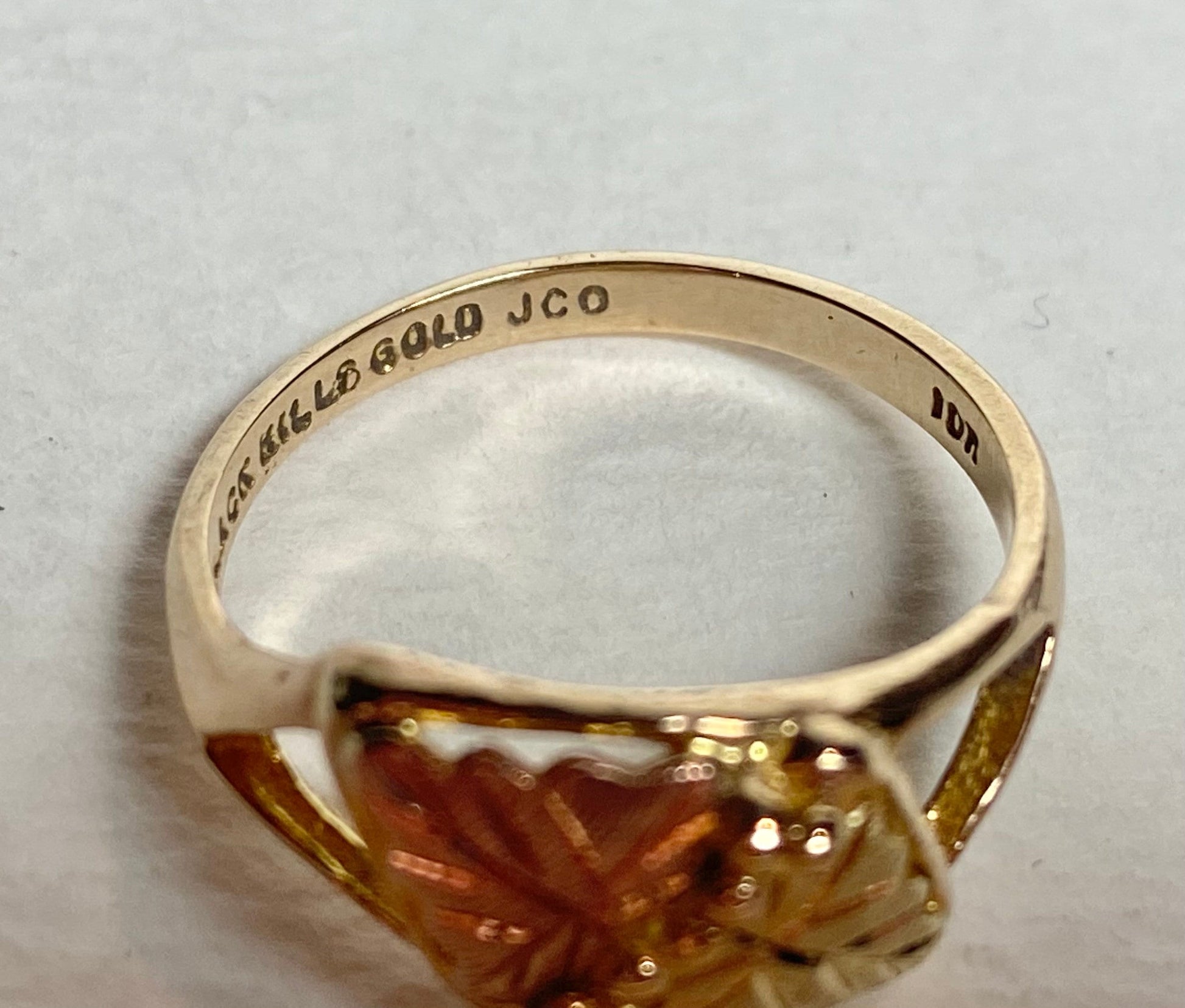 Black Hills Gold ring with JCO and 10k stamps.