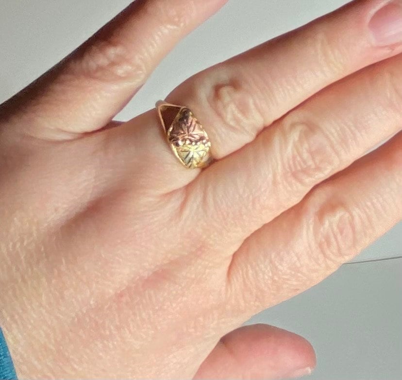 Black Hills Gold ring with a two-leaf design in 10k gold.