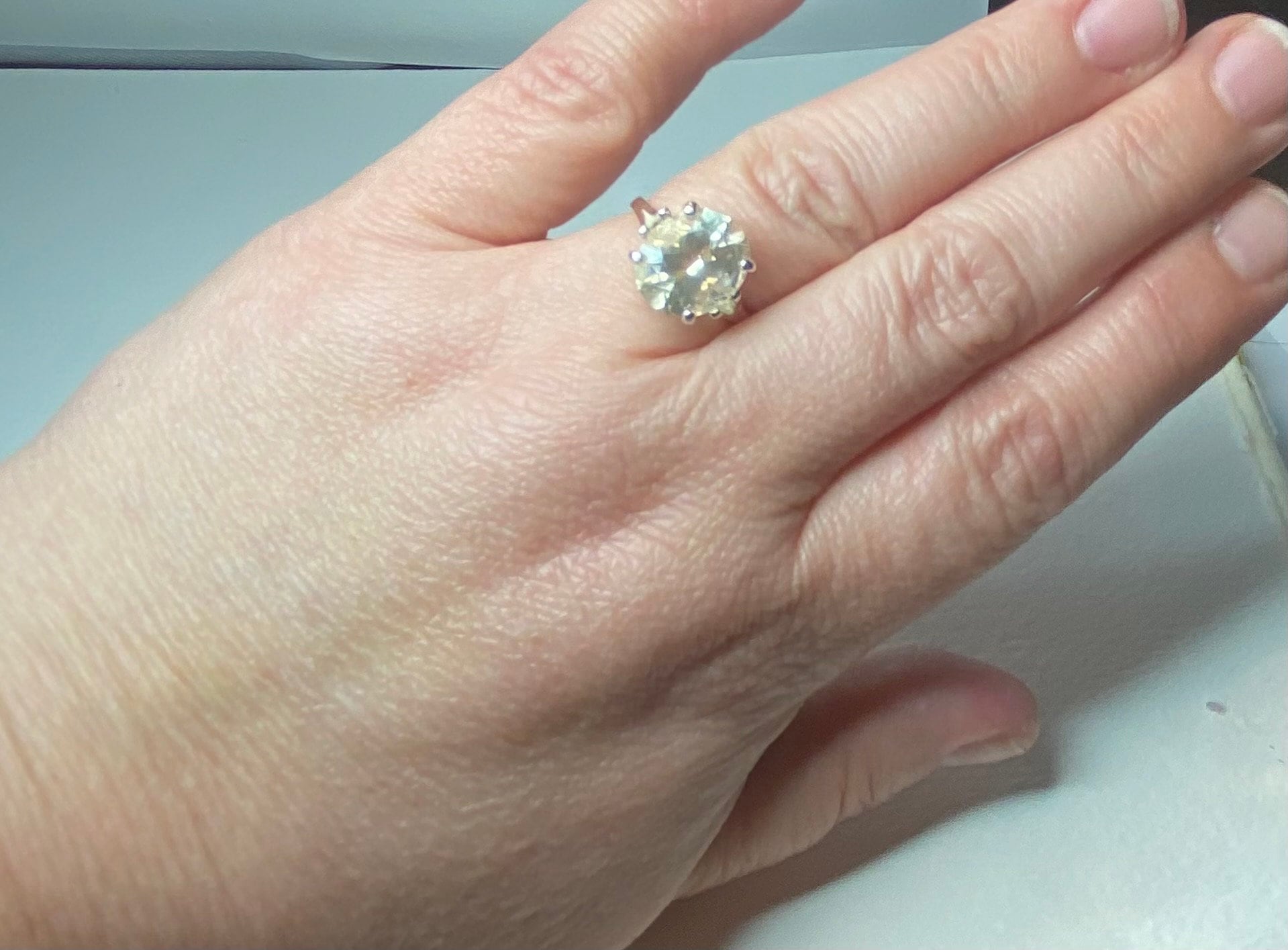 Sterling silver ring with a 12x10mm oval Oregon Sunstone.