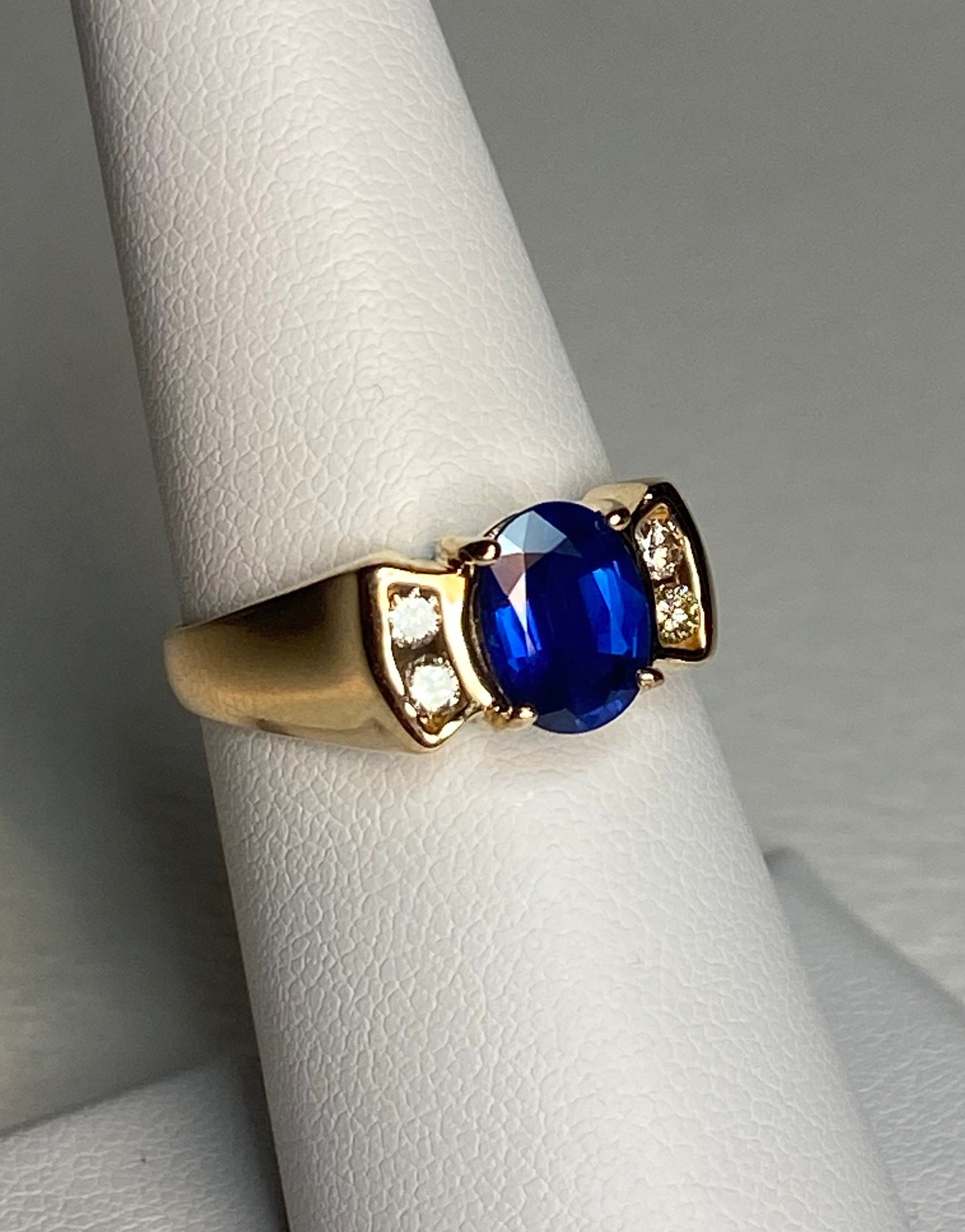 Levian 14k yellow gold ring with sapphire and diamonds.
