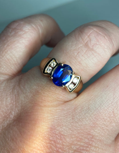 Levian 14k yellow gold ring with sapphire and diamonds.
