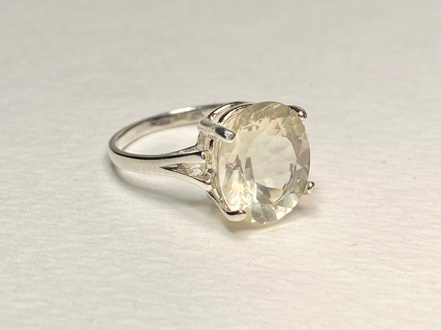 Sterling silver ring with a 12x10mm oval Oregon Sunstone.